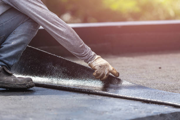 Professional Waterproofing technician working in Levittown, NY